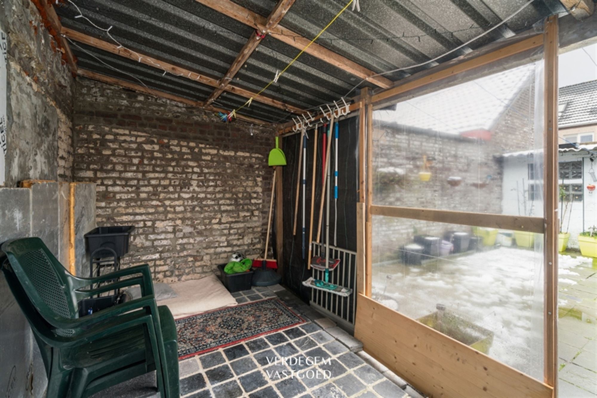 Centraal gelegen rijwoning met 4 slaapkamers en stadstuintje foto 15