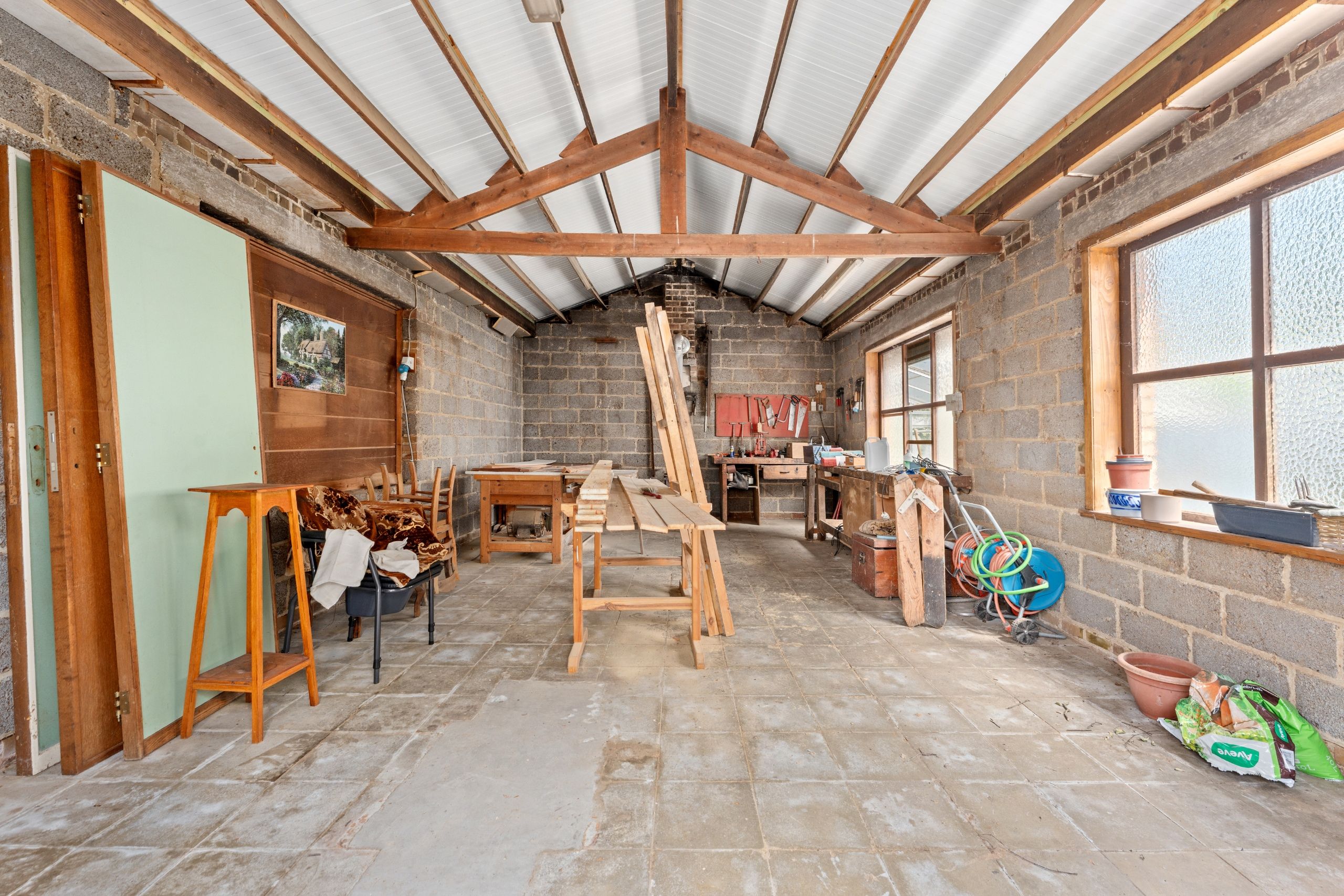 Charmante op te frissen woning met atelier in residentiële buurt foto 20