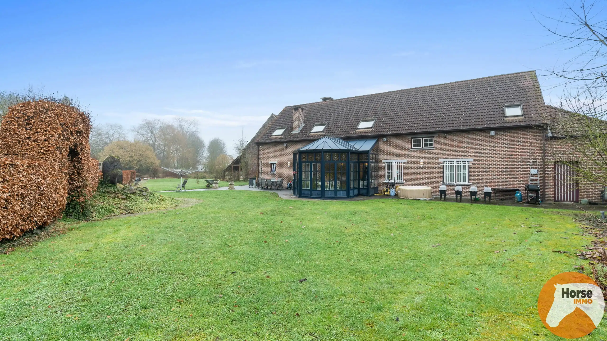 TOLLEMBEEK - Prachtige woning met 3 loodsen op +-2,9ha. foto 24