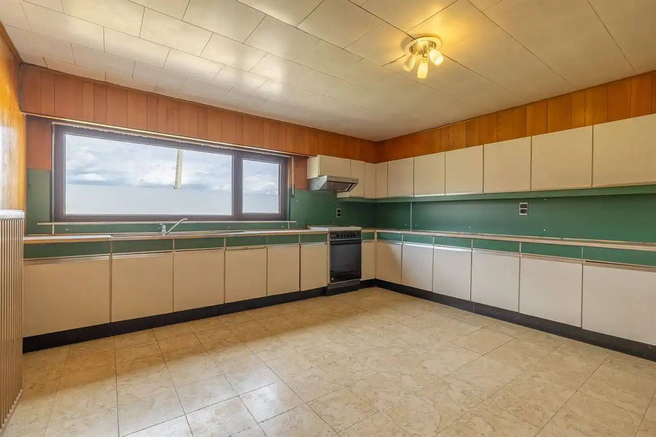 Te renoveren boerderij met 2 weides (45a en 21a) en ruime hangaar foto 11