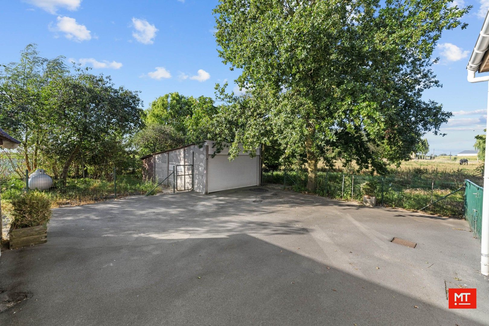 Landelijk gelegen alleenstaande woning met 3 slaapkamers, tuin en garage in Bikschote foto 5