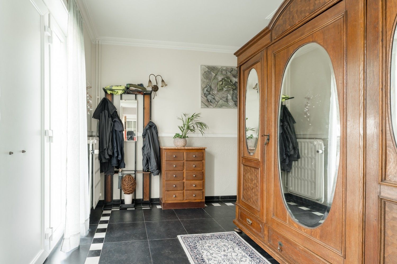 Instapklare gezinswoning met veranda en prachtige tuin foto 2