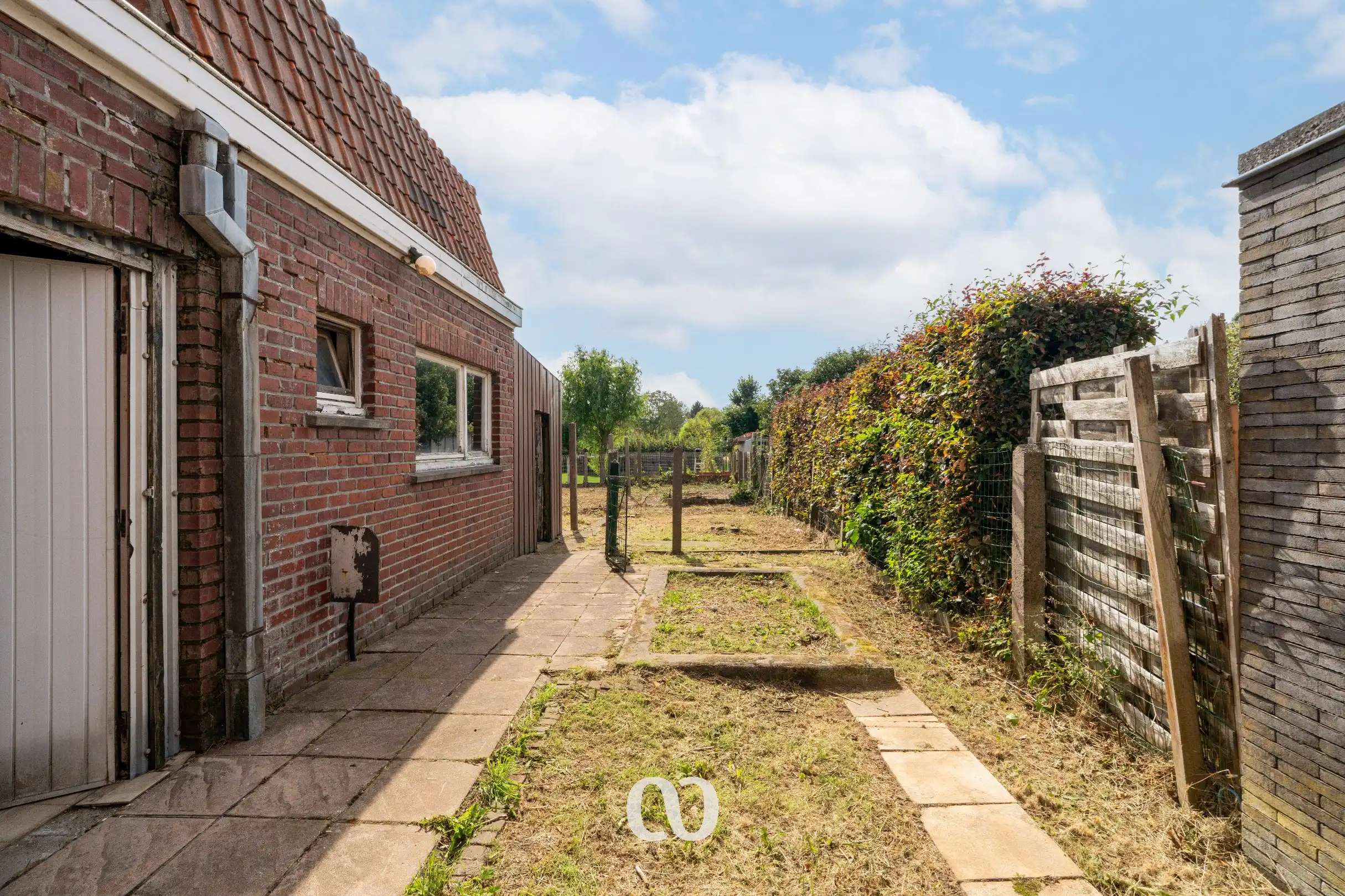Te renoveren gezinswoning met 4 slaapkamers en tuin in Oudenaarde foto 13
