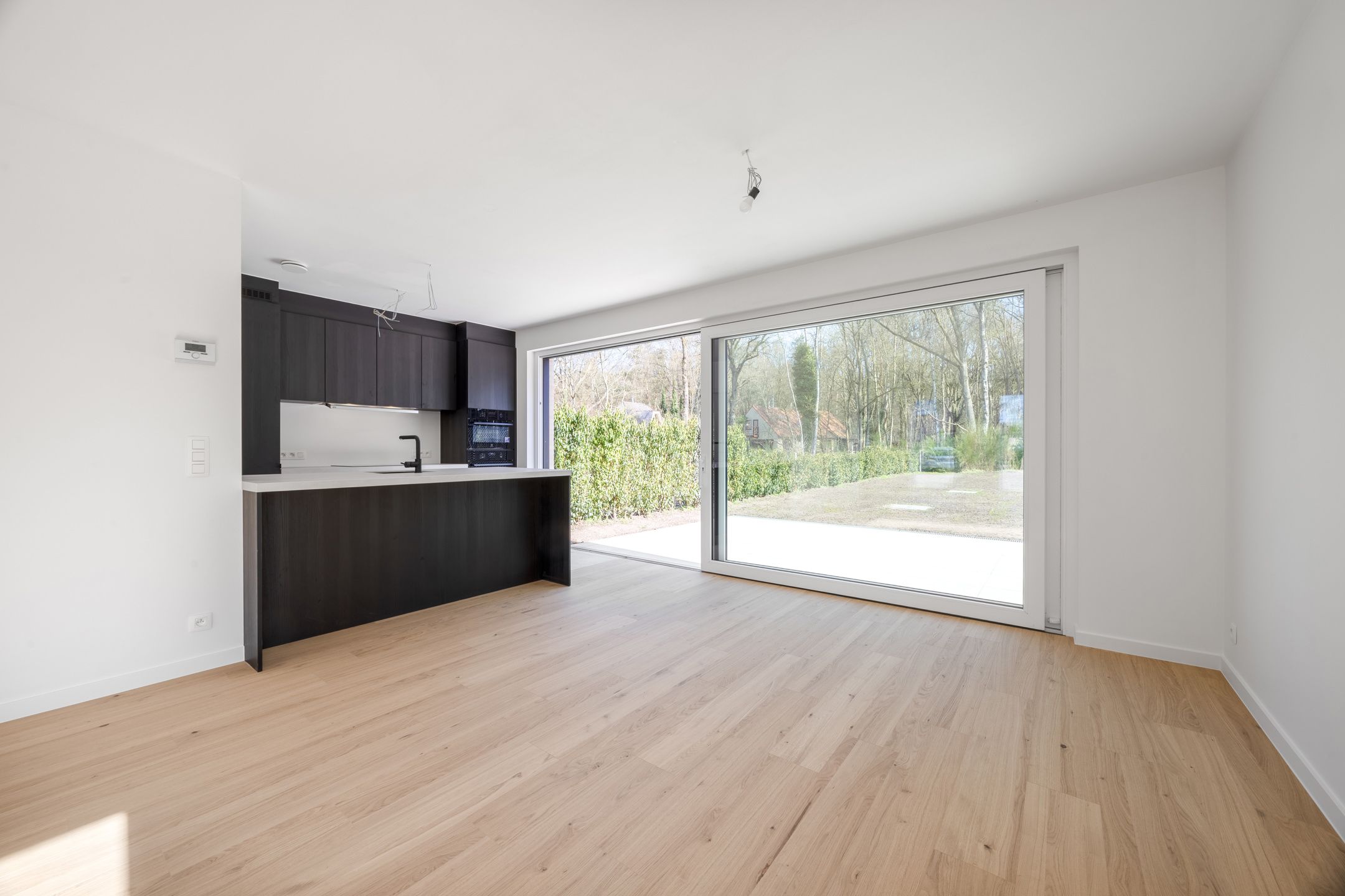 Stijlvolle nieuwbouwkoppelwoning met adembenemend boszicht foto 9