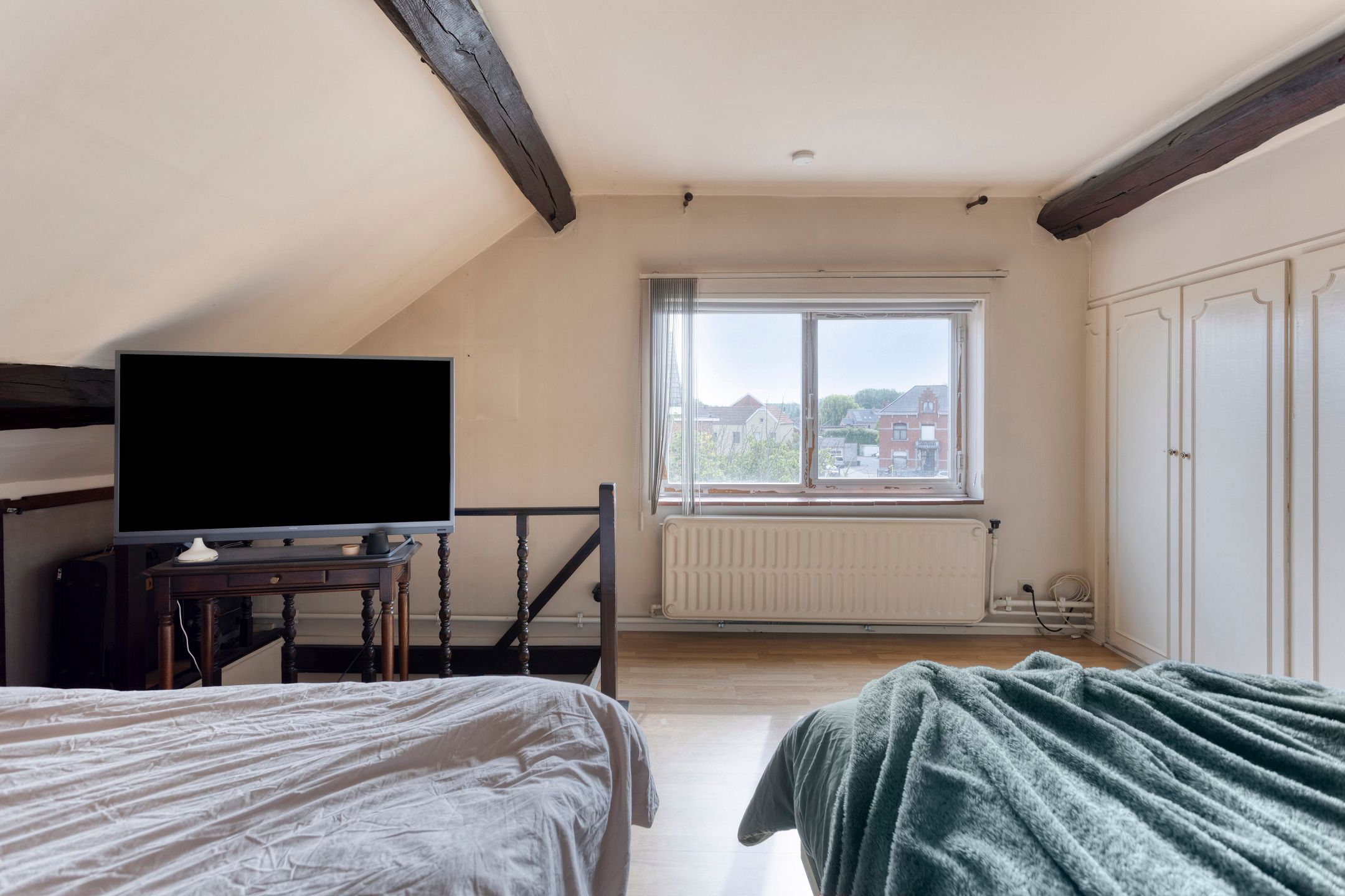Woning met 4 slaapkamers en tuin op uitstekende ligging foto 9
