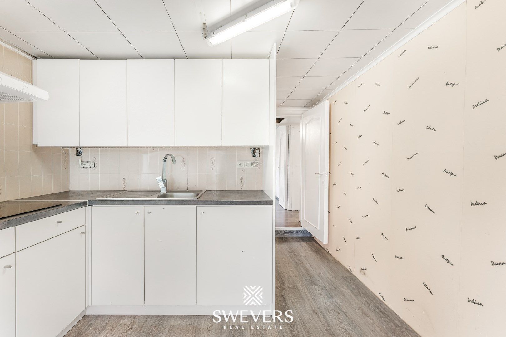 Instapklare woning met handelszaak en appartement in Geetbets foto 30
