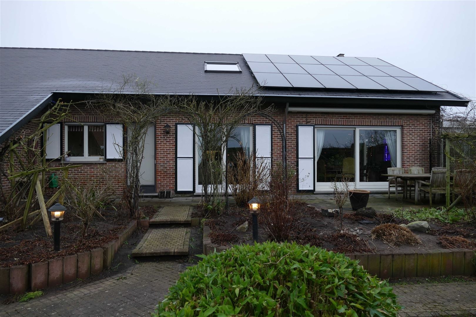 Exclusieve villa op riant hoekdomein in Eksaarde  foto {{pictureIndex}}