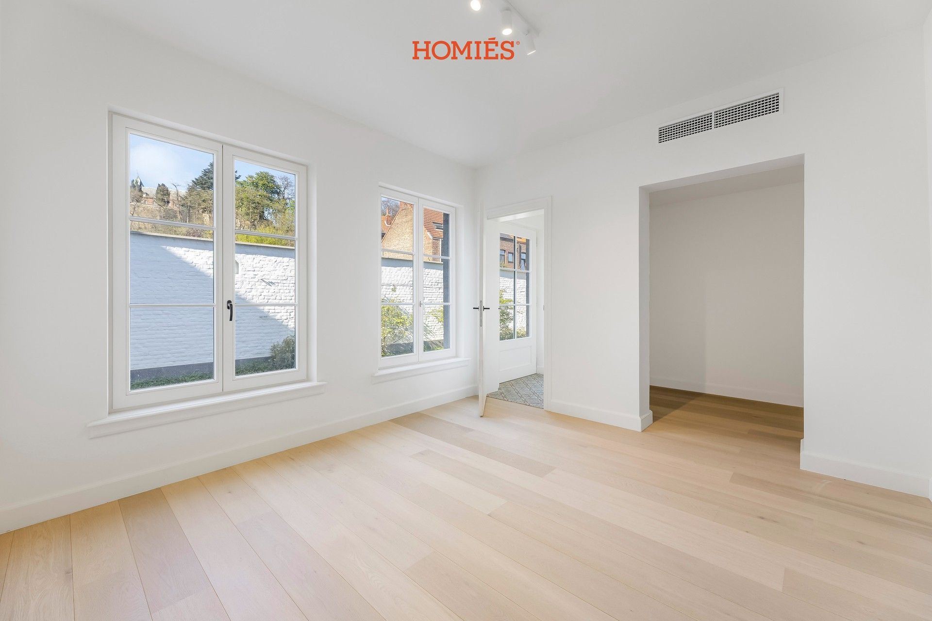 High-end gelijkvloers appartement met tuin, in historisch pand foto 8
