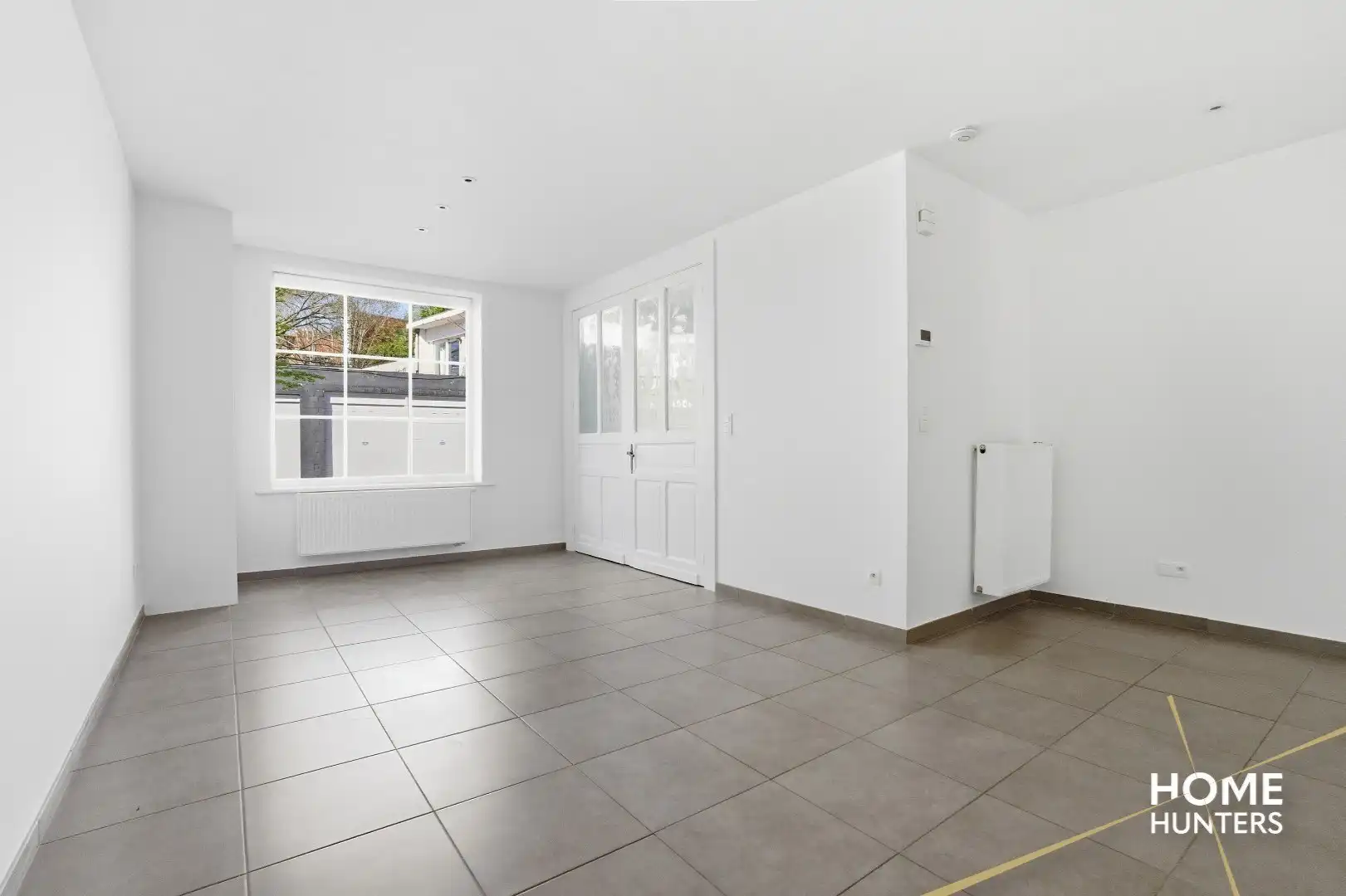 Charmante en instapklare woning met unieke stadskoer en garage foto 5