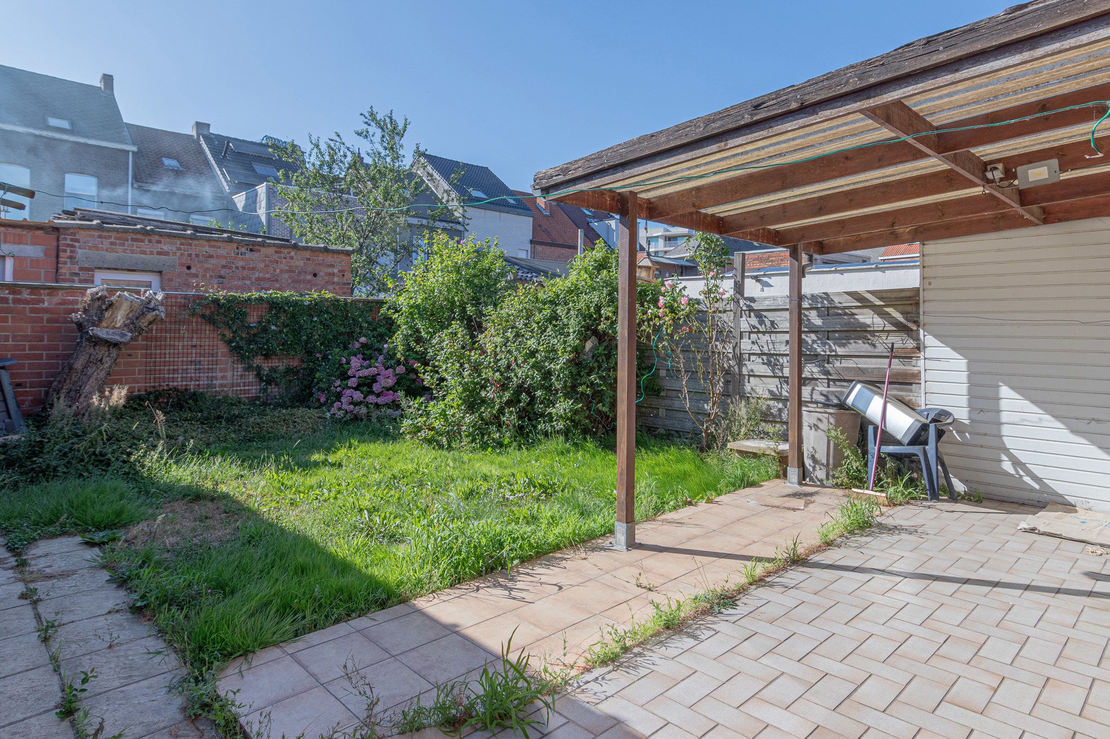 Gezellige halfopen bebouwing met garage en knusse tuin foto 9