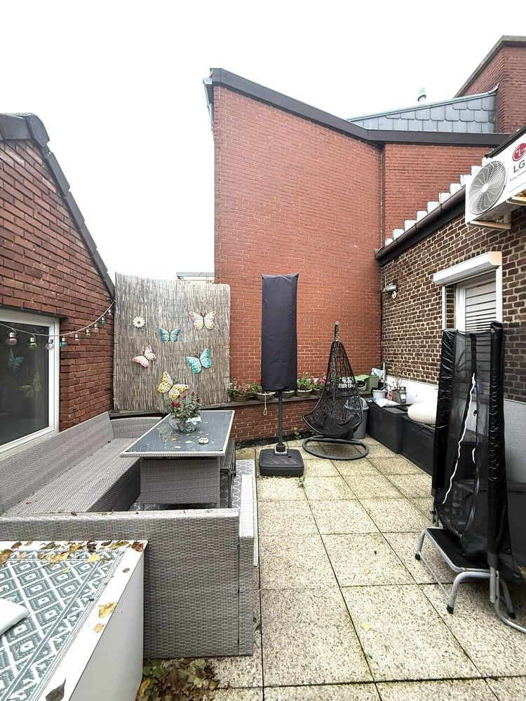 Charmante duplex met vernieuwde keuken, airco, berging en ruim dakterras in Lanaken foto 10