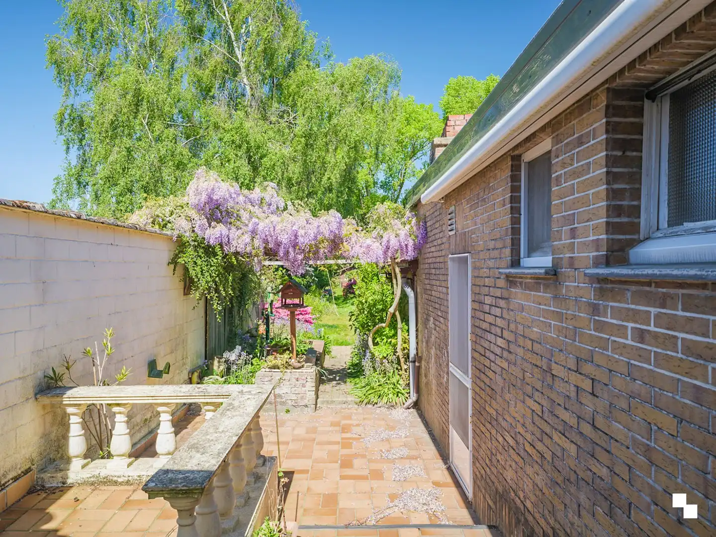 Te renoveren woning met gezellige tuin in het hart van Merelbeke foto 17