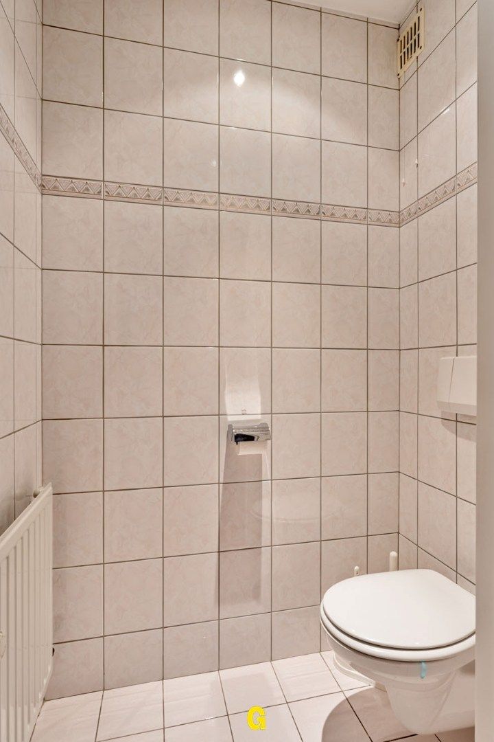 Bijzonder nette rijwoning van zeer degelijke kwaliteit, met tuin op 6a 46ca, vlak bij de dorpskern van Hoeselt. foto 5