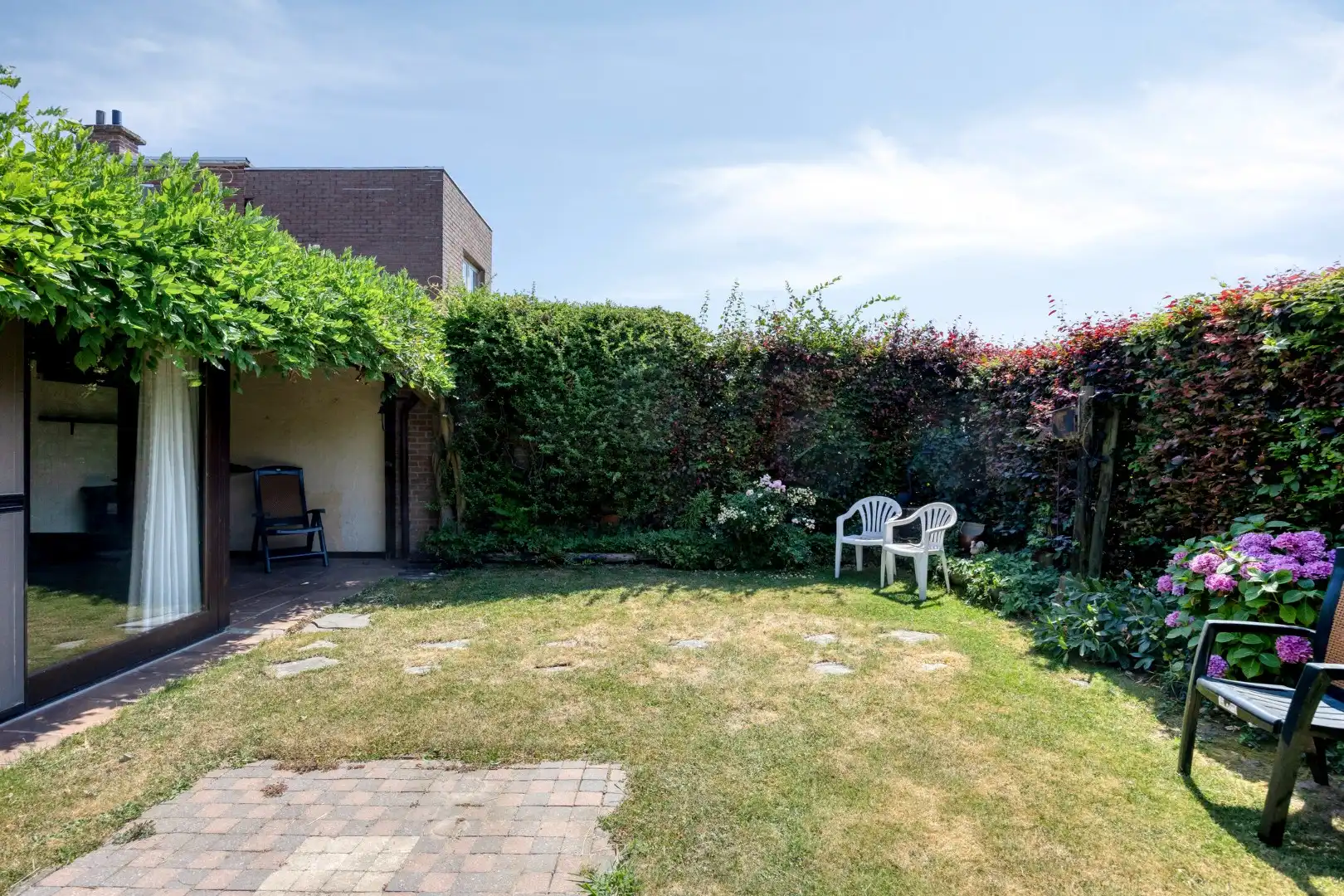 Gezellig ingerichte woning met garage en tuin - stadsrand Tongeren foto 21