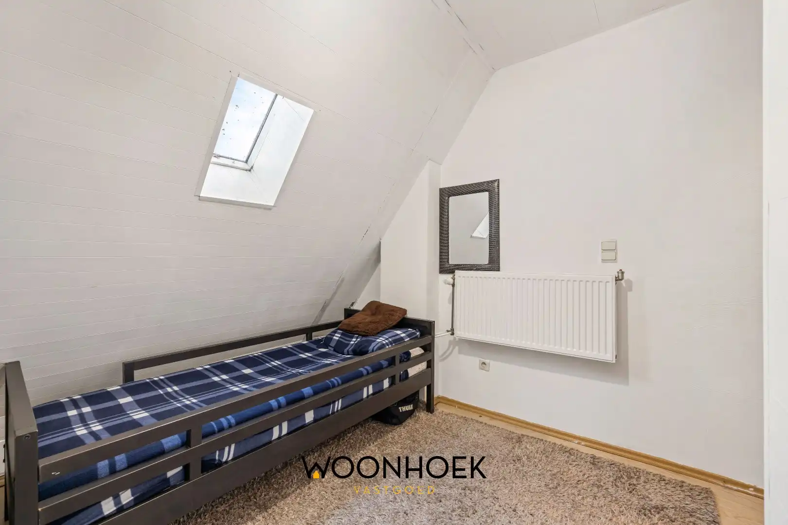 Centraal gelegen, 3-slpk starterswoning in het centrum van Lokeren foto 12