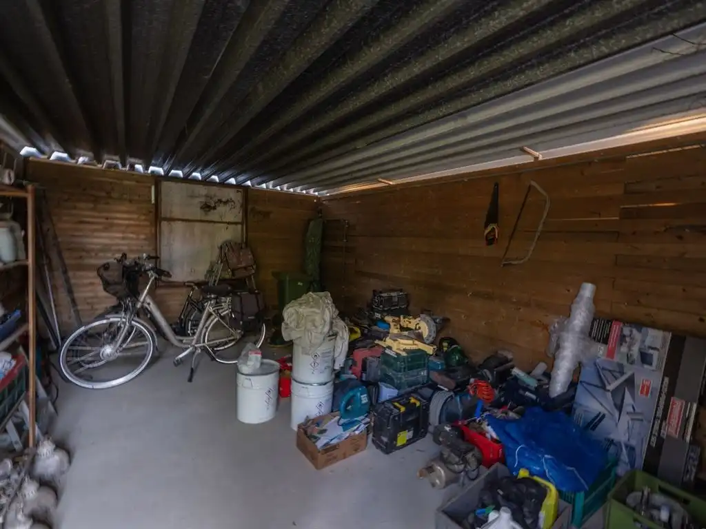 Gezellige, instapklare gezinswoning op riant perceel foto 16