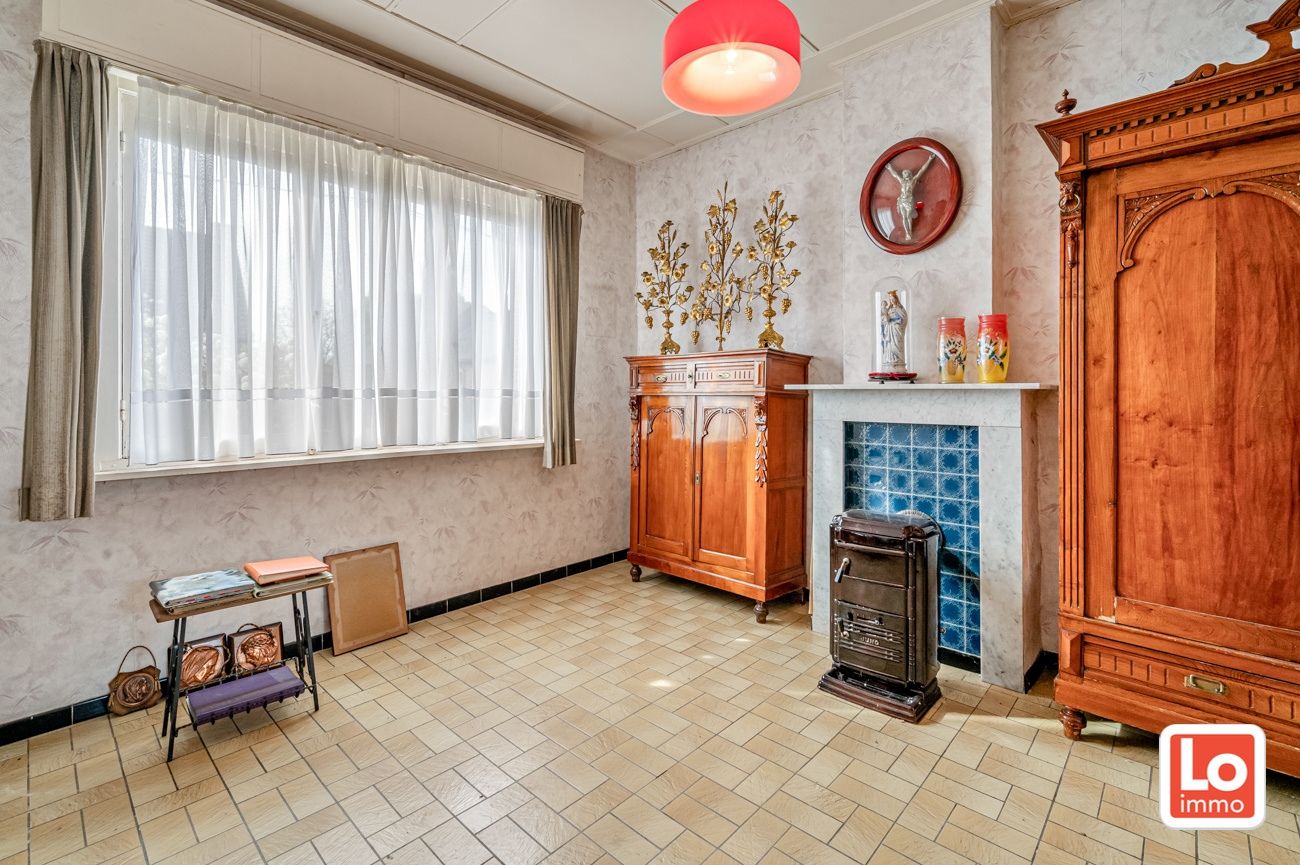 Landelijk gelegen halfopen woning met verschillende stallingen op groot perceel grond met open zicht in Zeveneken! foto 8