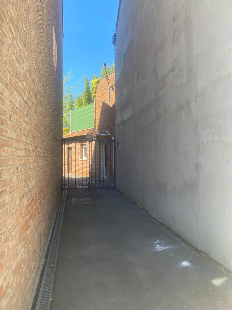 Centraal gelegen te renoveren woning met ruime garage en achterliggende tuin foto 24