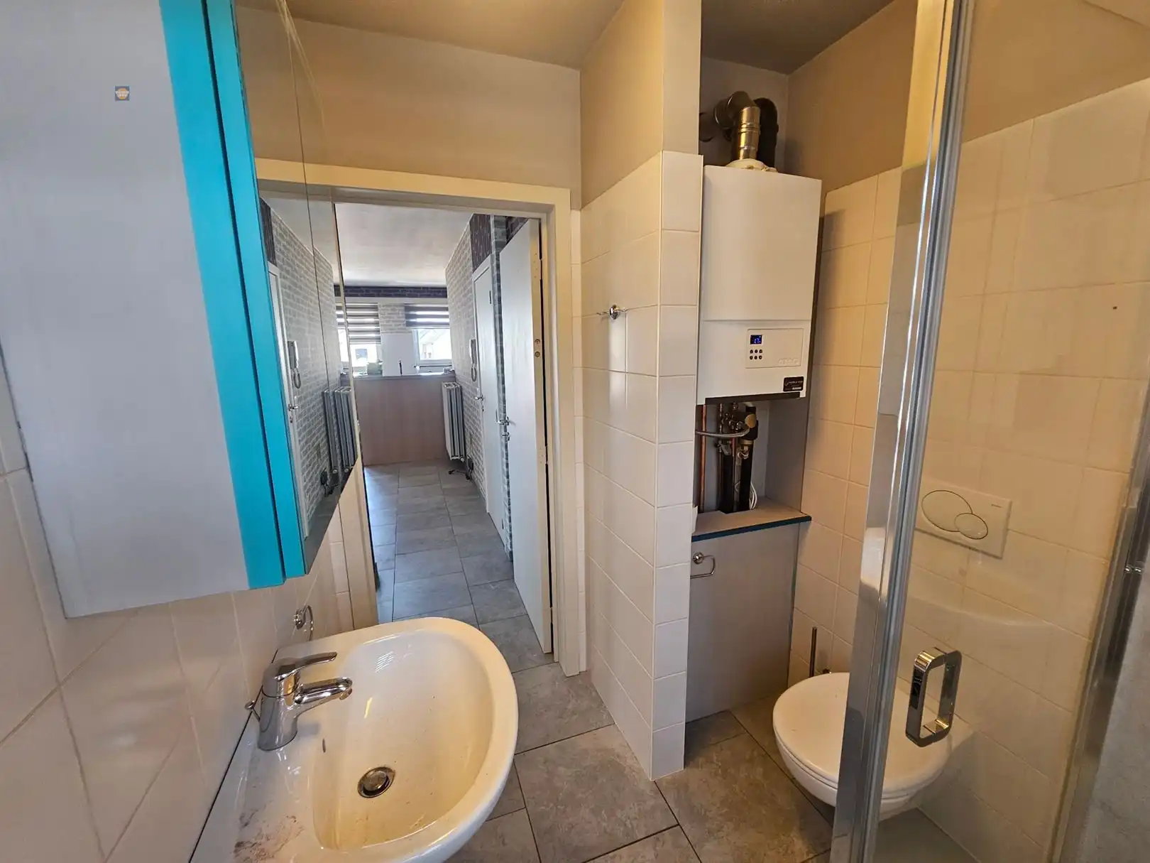 Instapklaar 1-slaapkamerappartement met kelderberging in centrum Willebroek foto 9