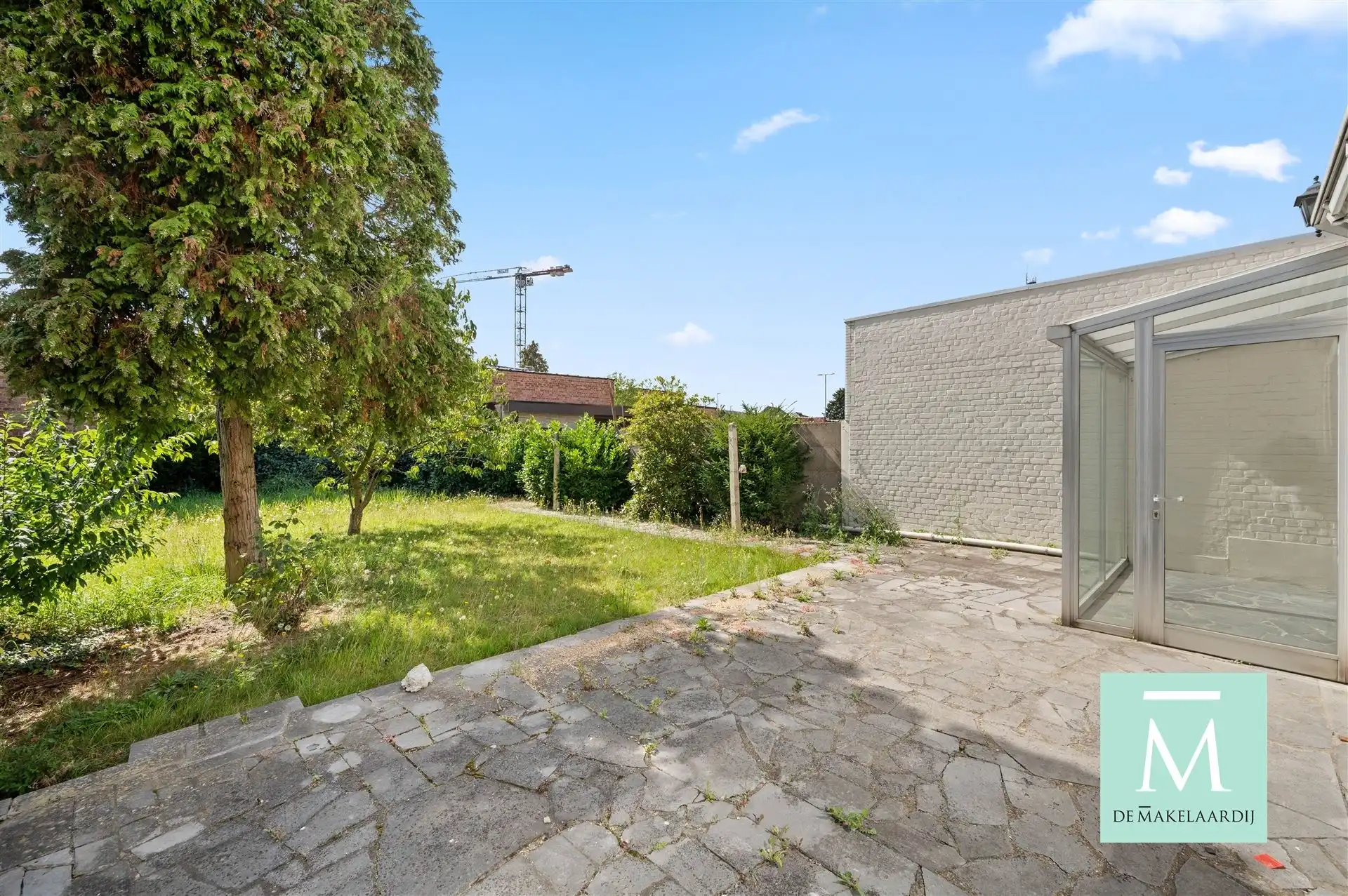 Ruime woning met 3 slaapkamers, aangename tuin en inpandige garage foto 14