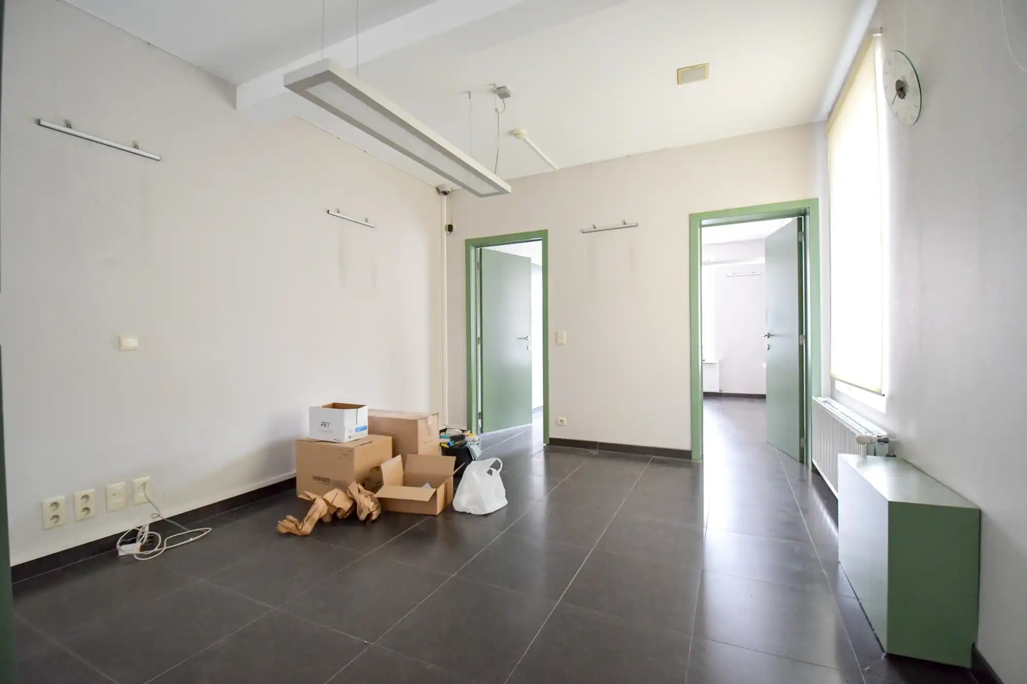 Handelsgelijkvloers en appartement  in centrum Oedelem foto 7