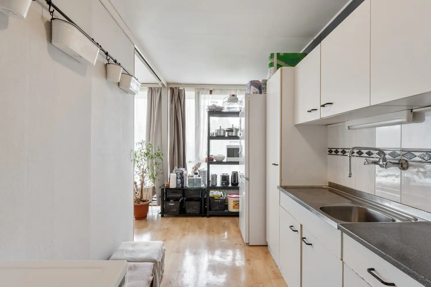 Gunstig gelegen appartement met 2 slaapkamers, ondergrondse autostaanplaats en kelderberging. foto 10