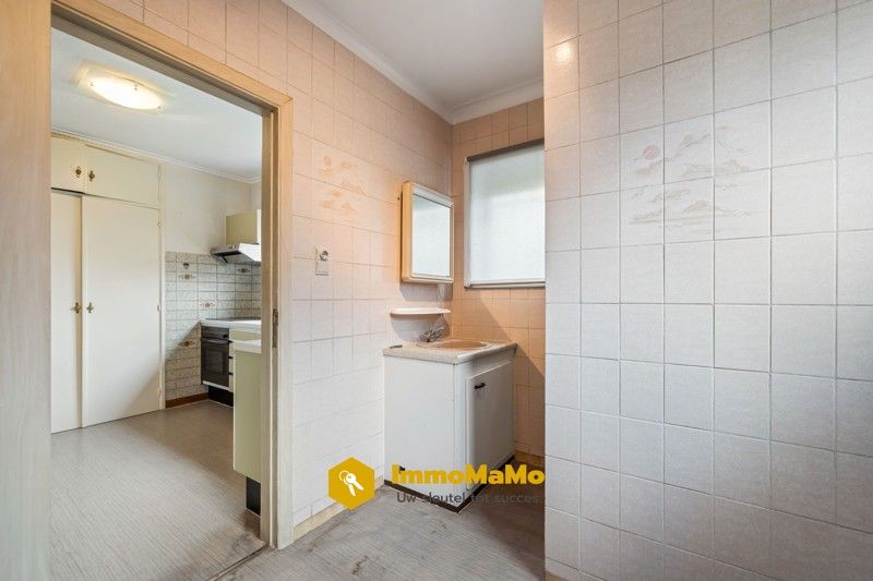 Te renoveren woonst in een rustige wijk te koop in Moerbeke foto 8