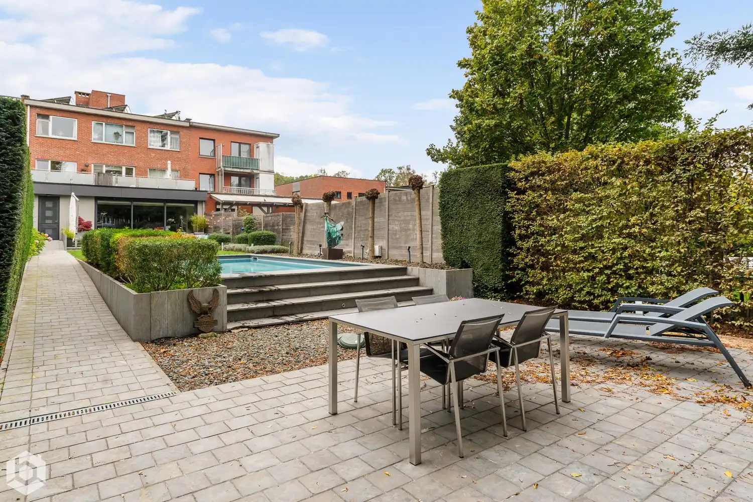 Exclusief gelijkvloers appartement met 2slpkrs, prachtige tuin en zwembad foto 32