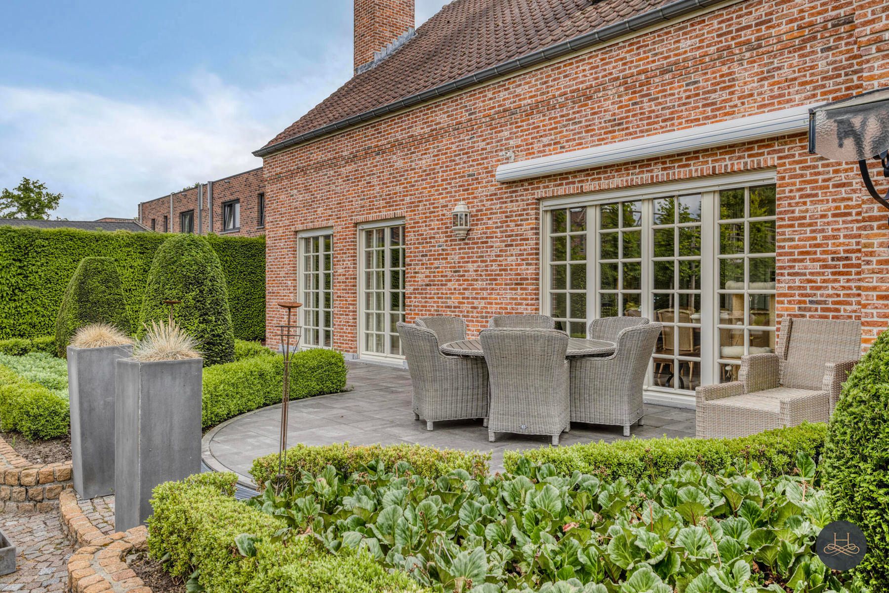 Stijlvolle woning met zorgvuldig aangelegde tuin foto 28