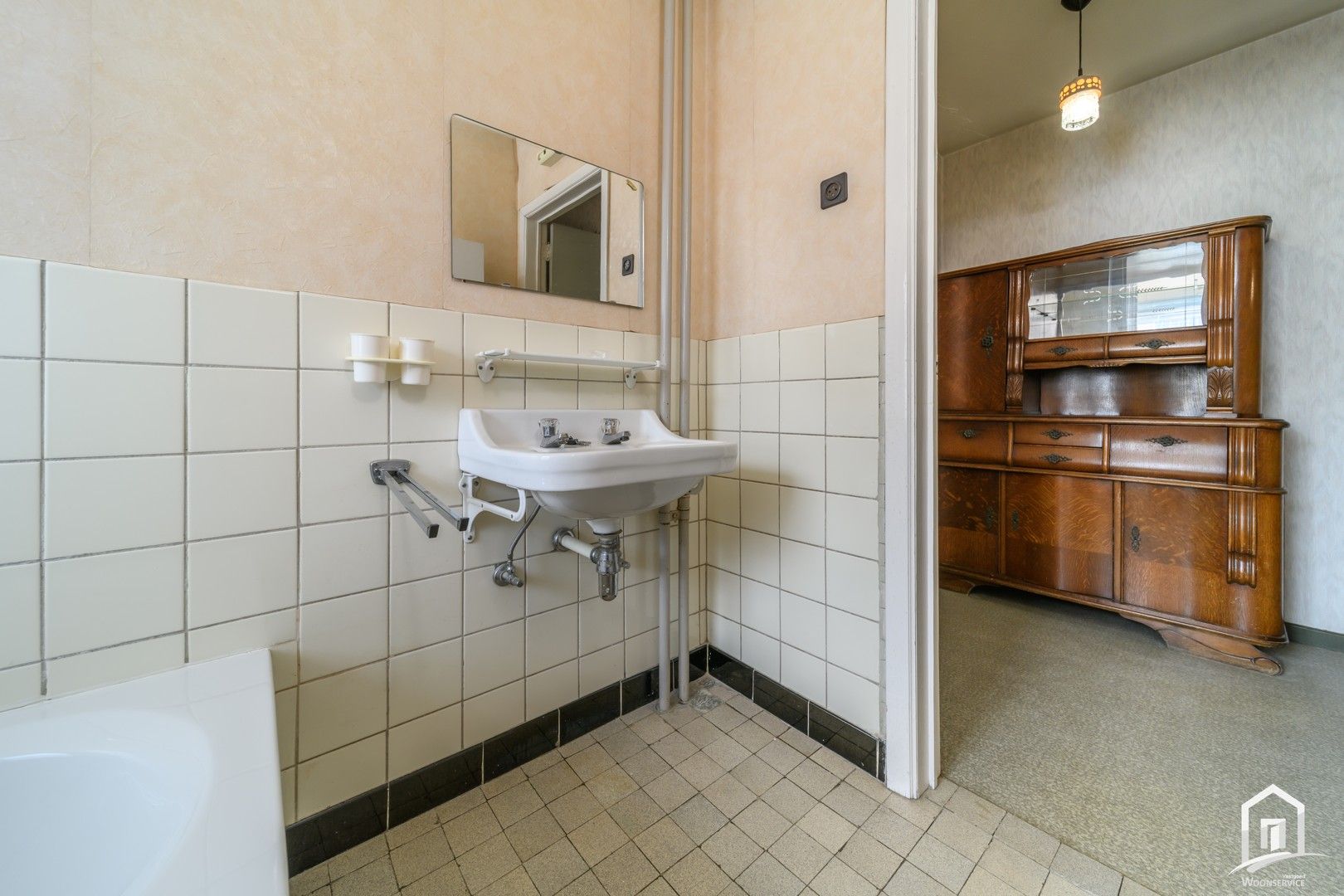 Gunstig gelegen gezinswoning met tuin en garage. foto 24