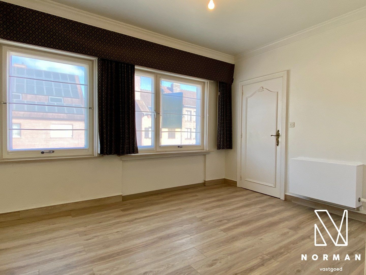 Halfopen woning te huur in het centrum van Kortrijk op een topligging! foto 8