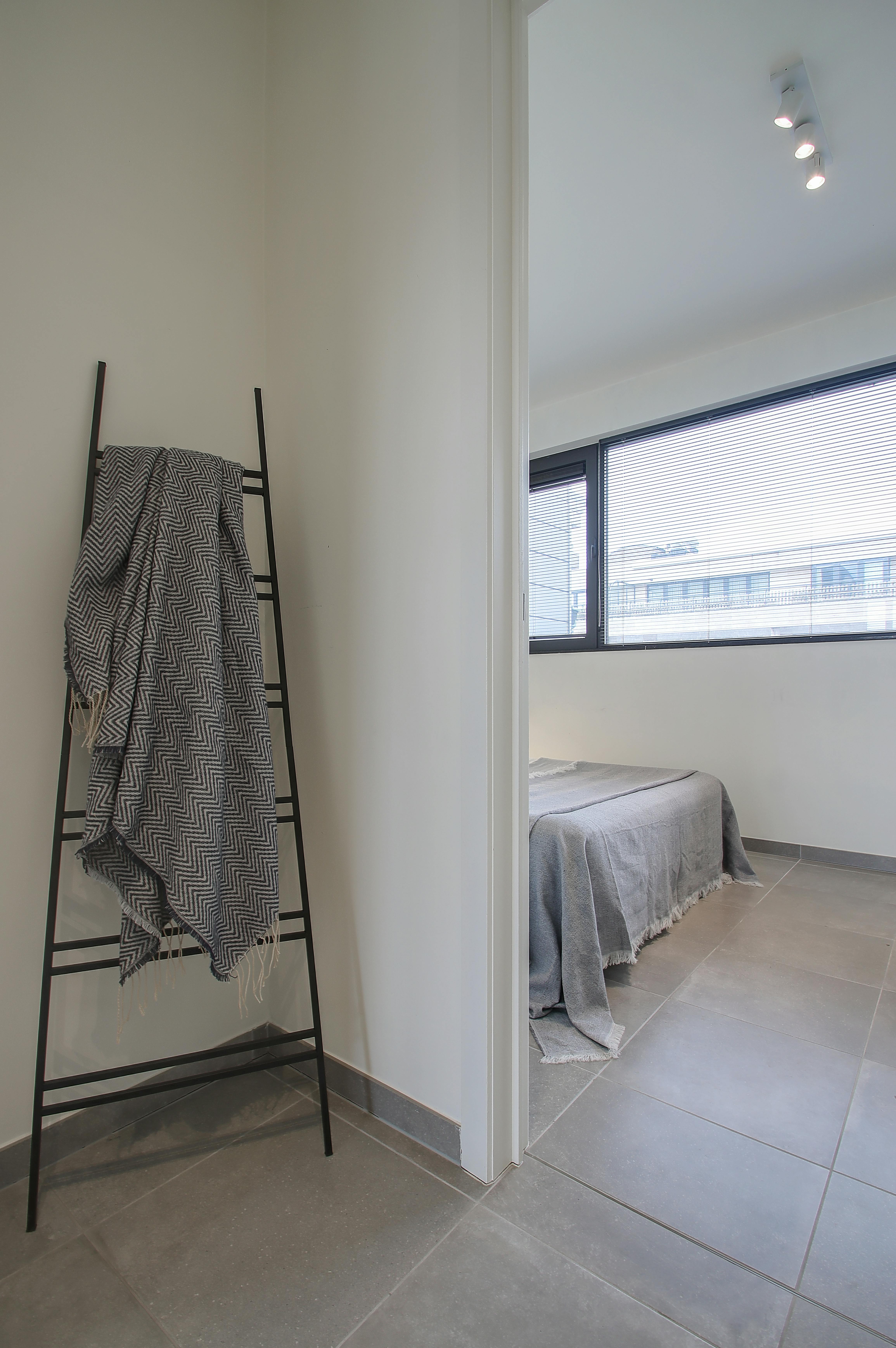 Ruim nieuwbouwappartement te koop in het centrum. foto 33