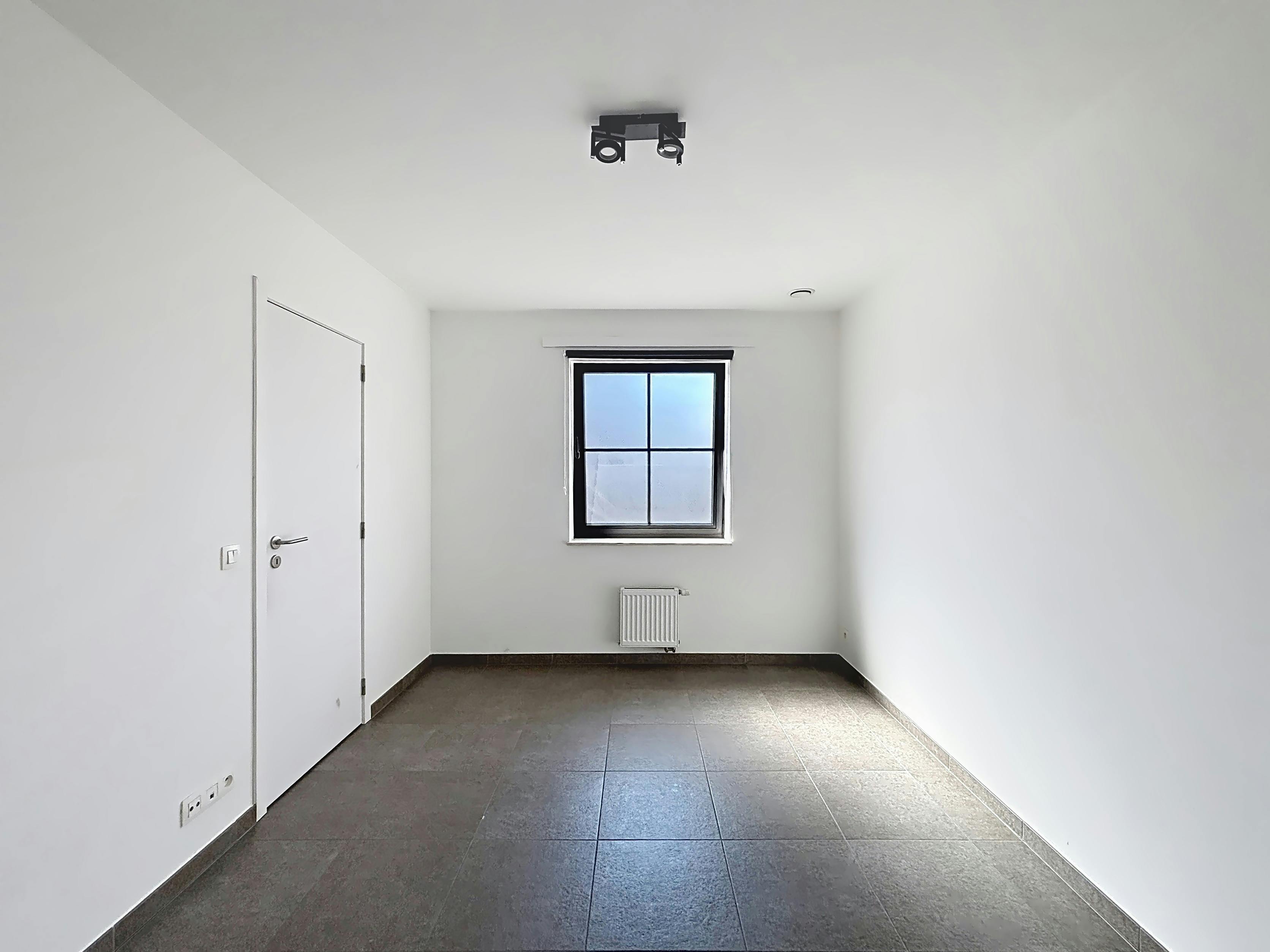 Eeklo Centrum: Instapklaar 1-slaapkamerappartement met garagebox foto 9