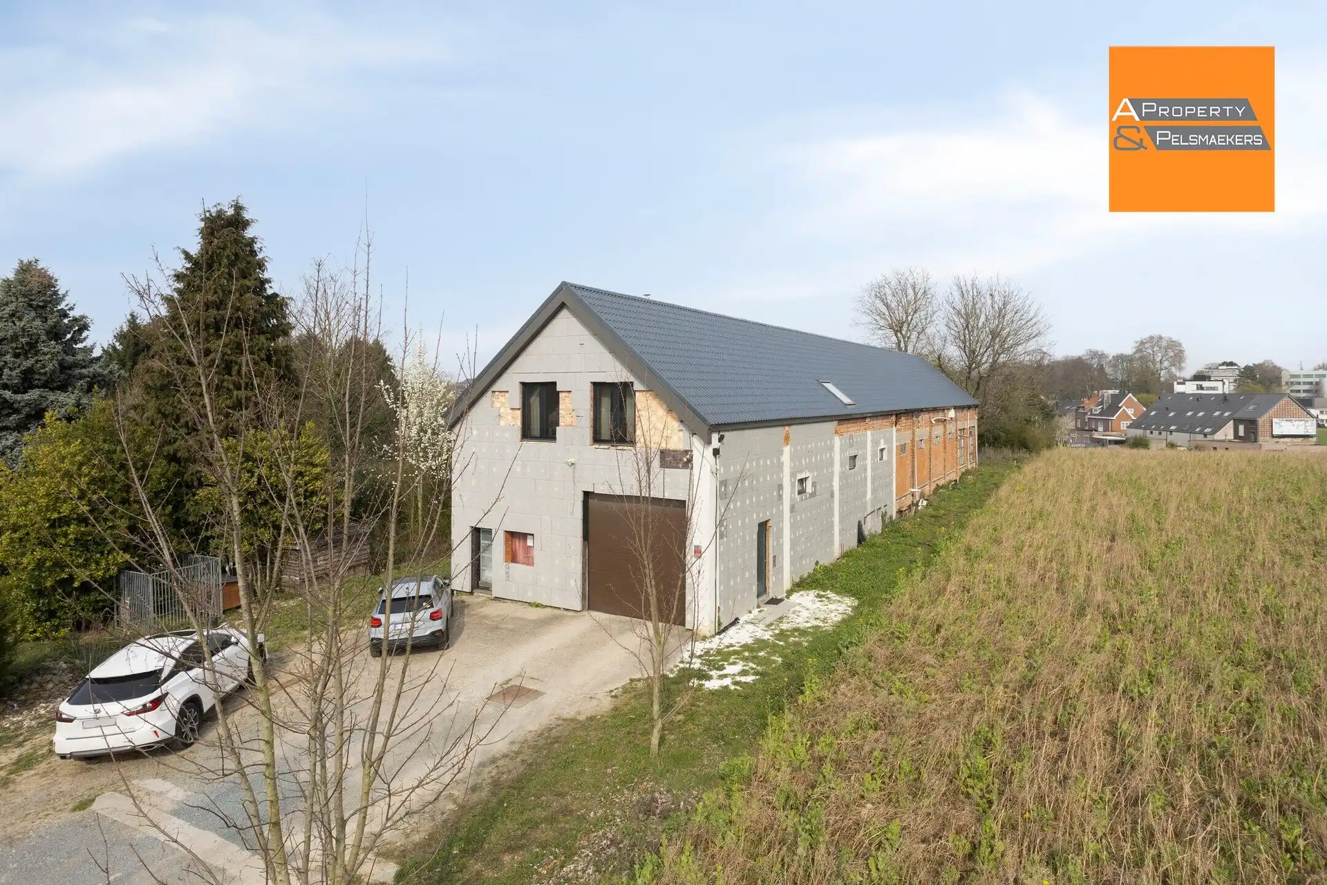 Hoofdfoto van de publicatie: Woning met loods. 