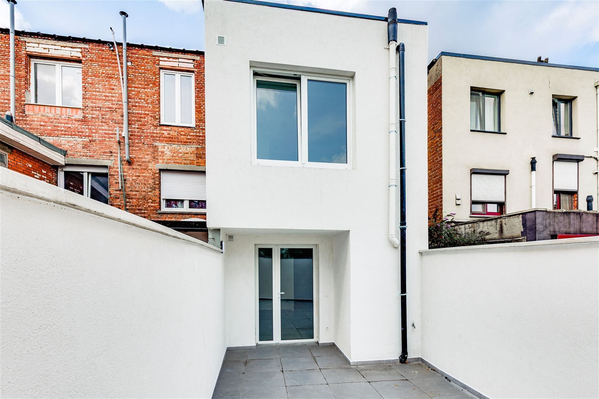 Gelijkvloers duplexappt met 3 slk + tuin foto 3