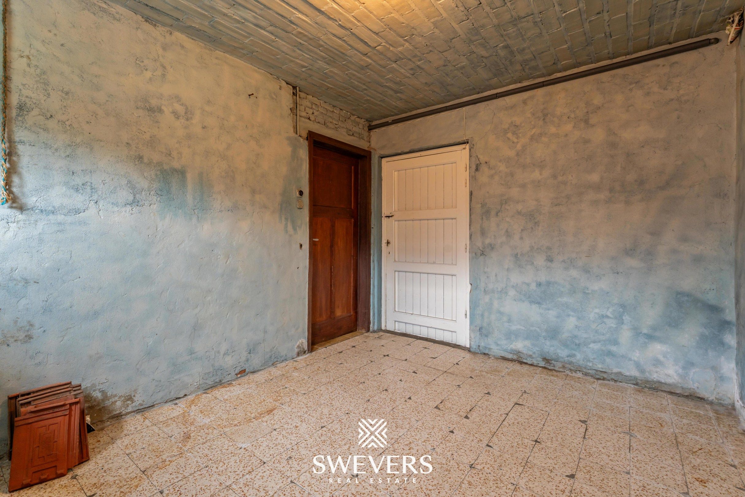 Ruime open bebouwing met potentieel en zuidgerichte tuin in rustige wijk van Houthalen foto 20