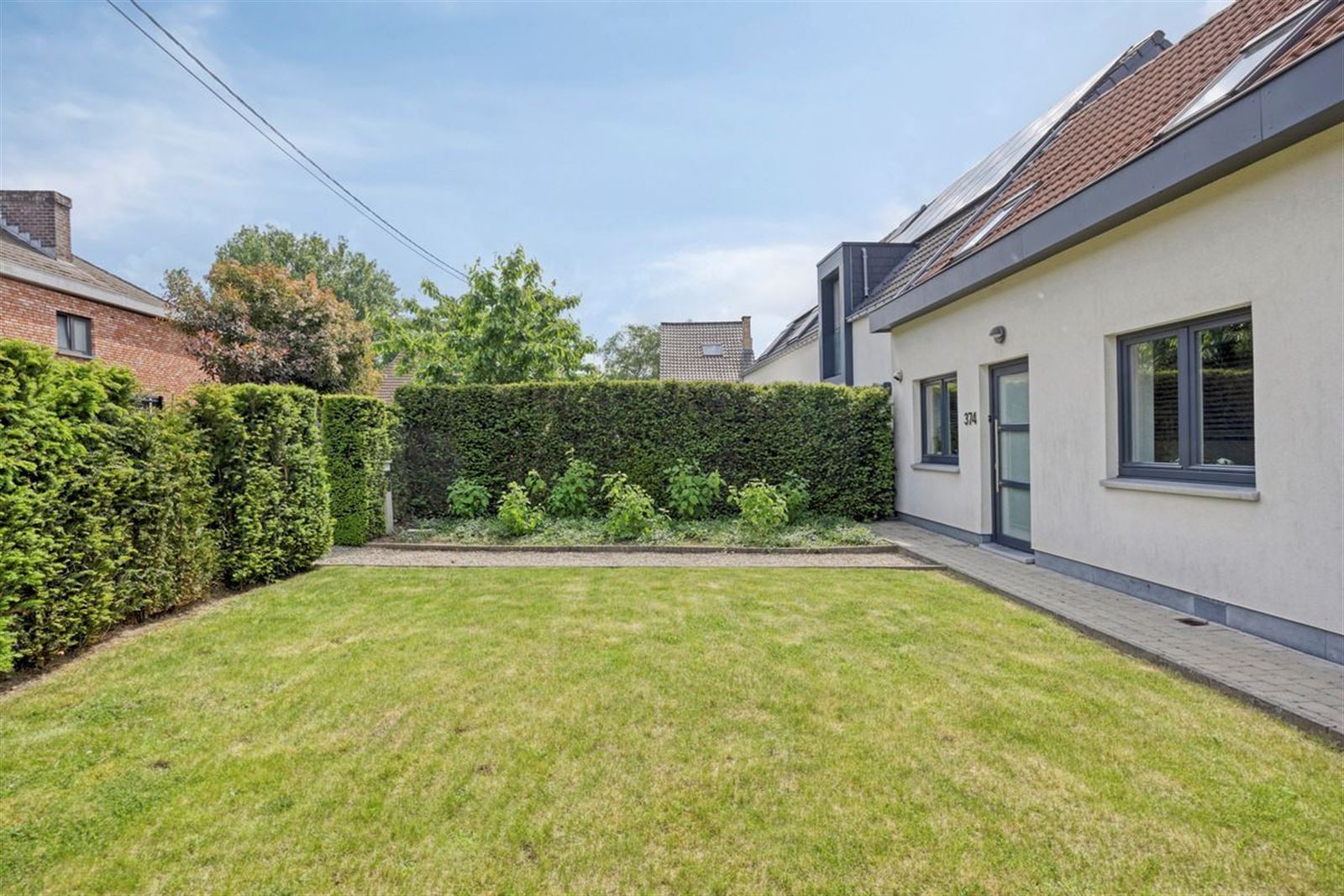 Instapklare, rustig achterin gelegen 3-gevelwoning nabij Hallerbos! foto 15