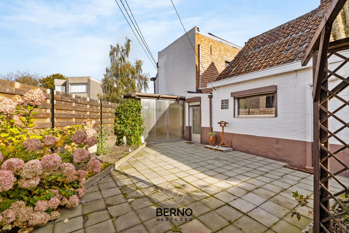 Centraal gelegen woning met tuin en garage. foto 14