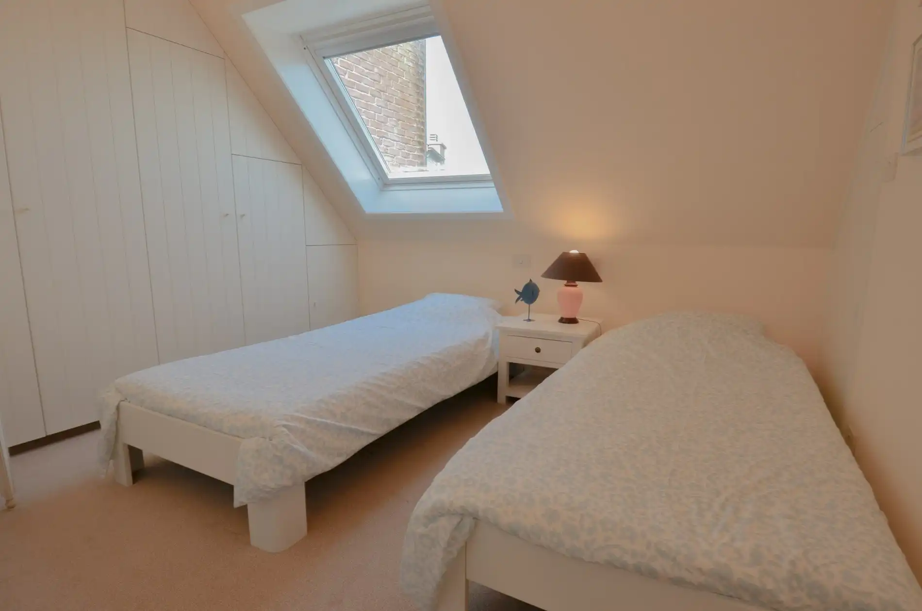 Stijlvol duplexappartement met zonnige terrassen en open zicht op de villa’s van het Zoute. foto 33