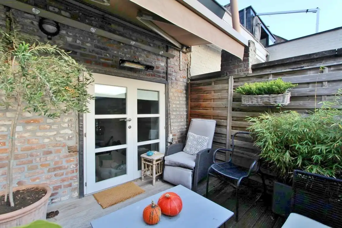 Gezellige triplex op toplocatie met 2 slaapkamers, terras en ondergrondse autostaanplaats foto 23