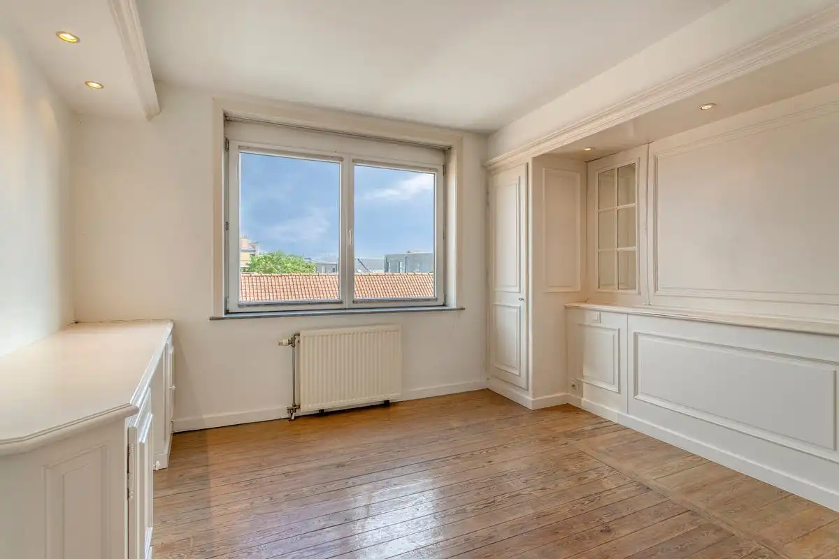 Bel-etage met 2 slaapkamers te koop op de Dam te Kortrijk! foto 10