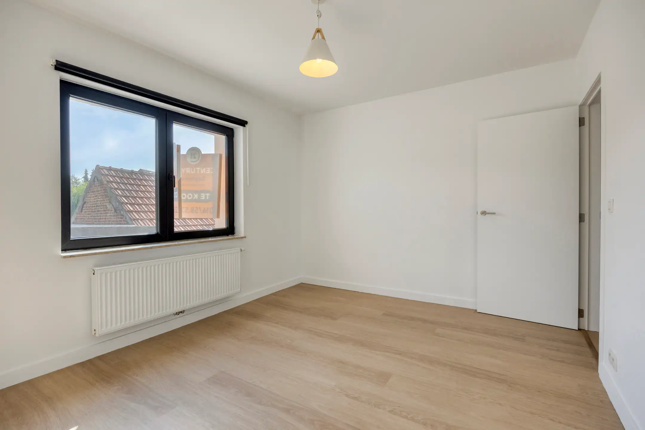 Instapklare starterswoning met 2 slaapkamers te Bertem foto 14