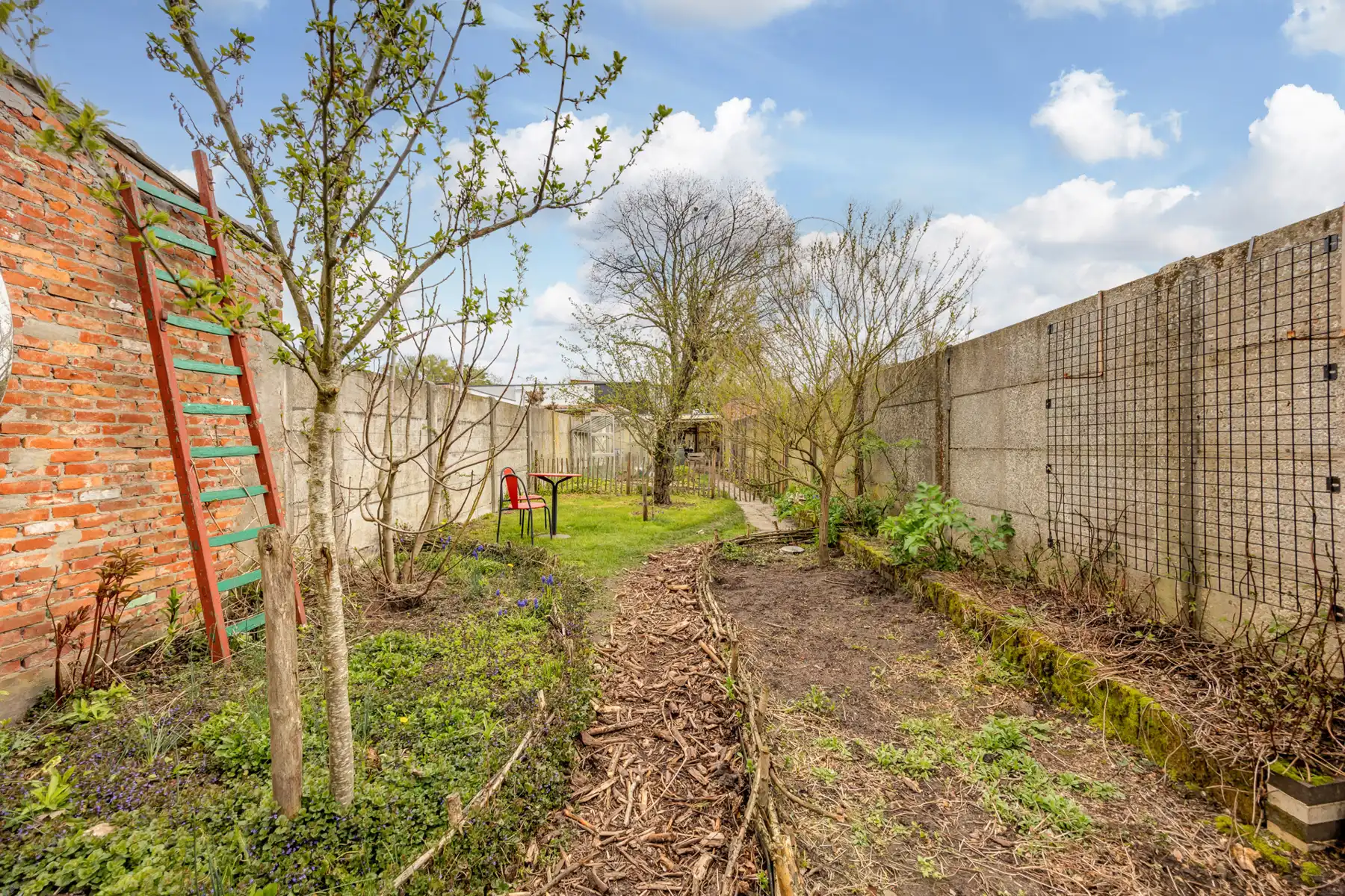 Stadswoning op een perceel van 230 m² met toegang achteraan de tuin. foto 14