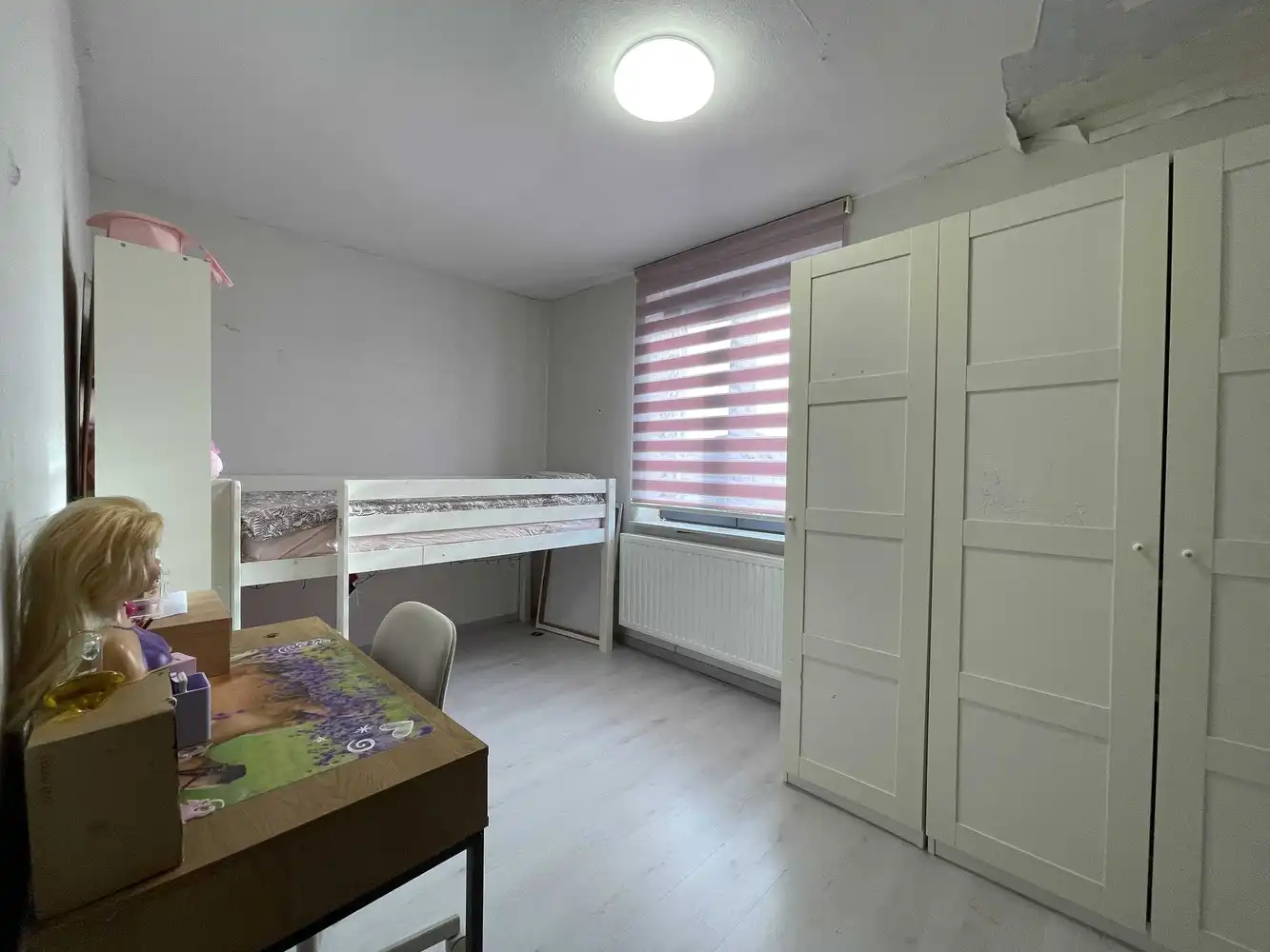 Rustig gelegen gezinswoning met grote tuin in Winterslag foto 12