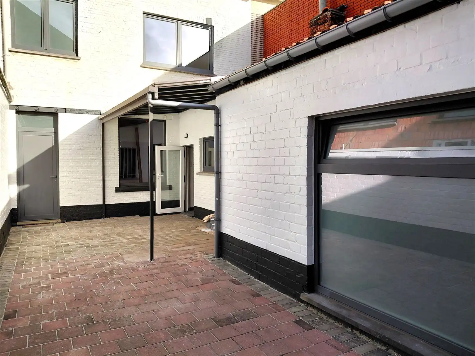 TE HUUR: Gesloten bebouwing met 2 slaapkamers in het centrum van Heusden! foto 21