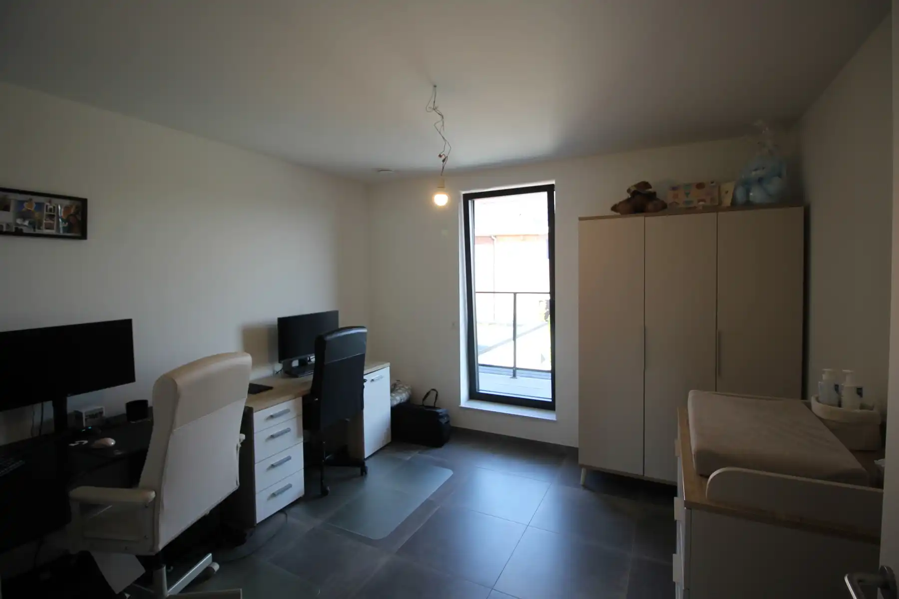 Ruim appartement van 122 m² met 2 slaapkamers, 2 terrassen, autostaanplaats en kelderberging. foto 9