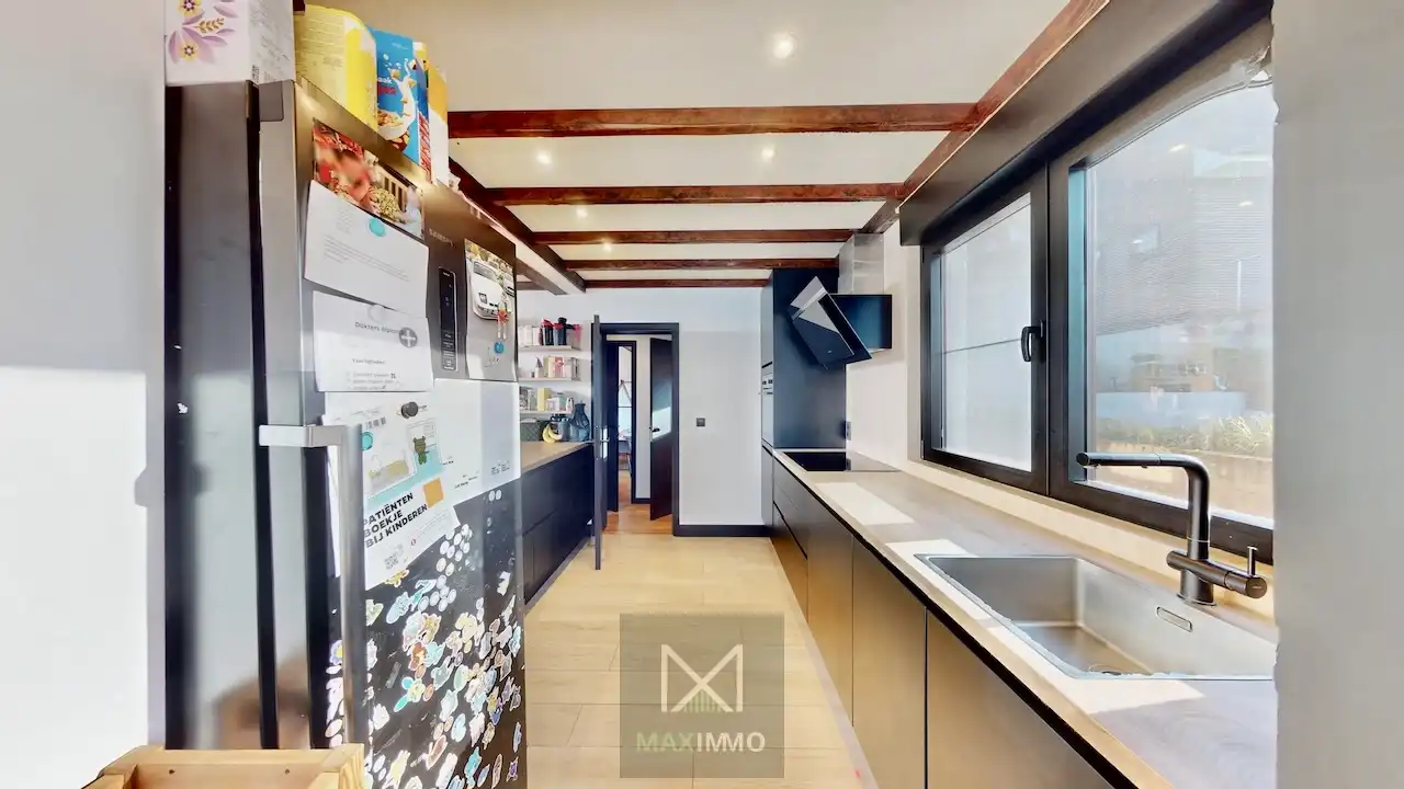 Gelijkvloerse bungalow met loods van 180 m² in het centrum van Marke foto 14