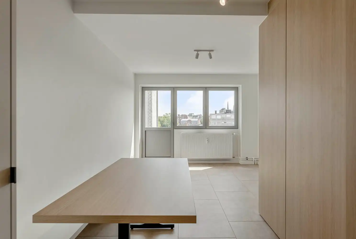 Totaalrenovatie! Centraal gelegen en hoogwaardig afgewerkt appartement met 1 slaapkamer en een terras te Leuven! foto 6