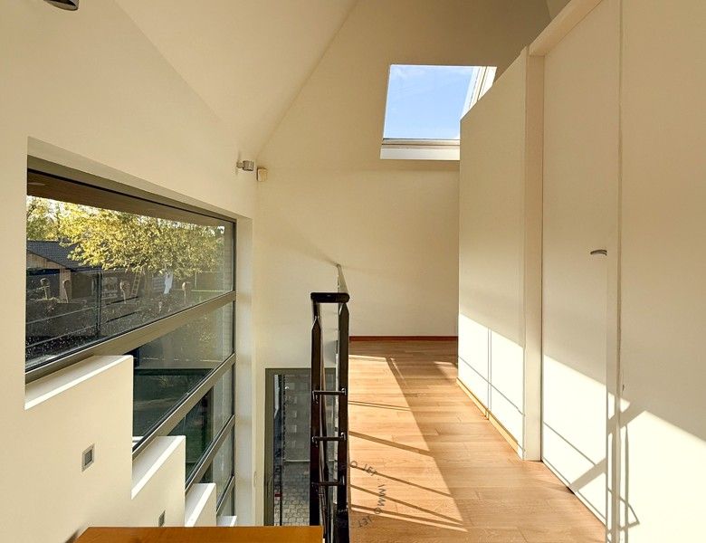 Ruime bel-etagewoning met 3 slaapkamers, tuin en garage foto 5