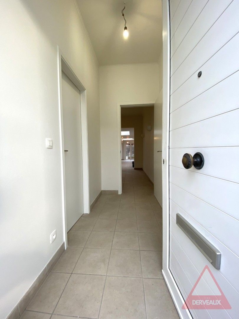 Heule – Woning met tuin op centrale ligging foto 2